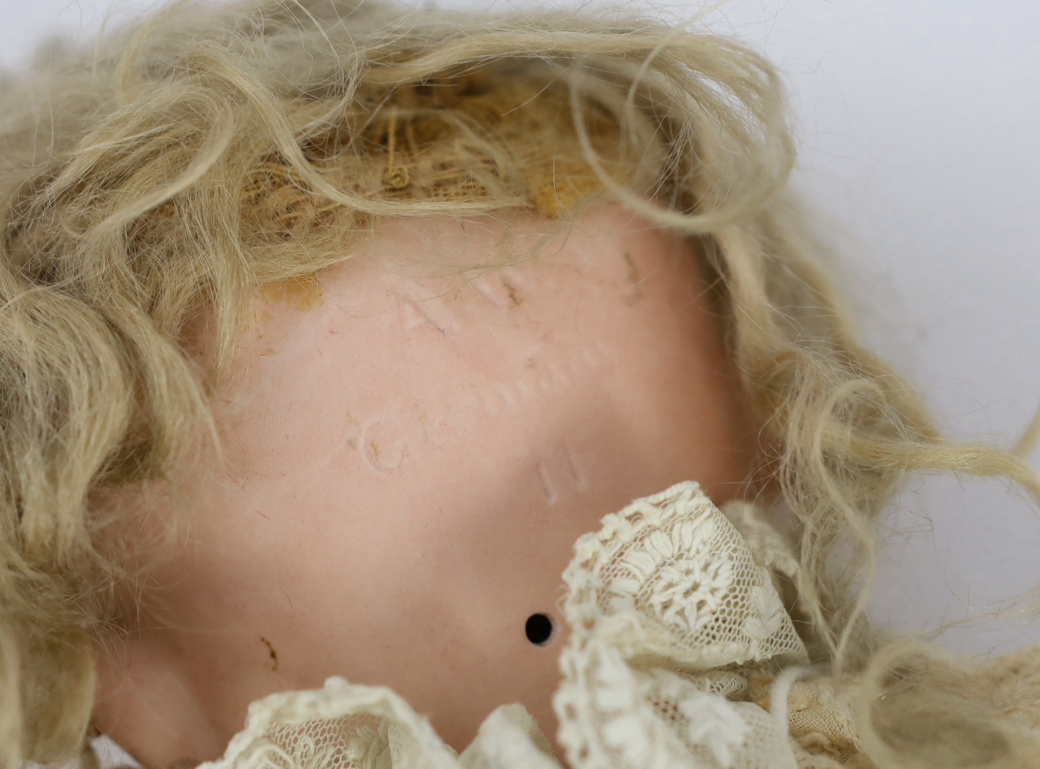An Adolf Wislizenus bisque doll, German, circa 1910, 24in.